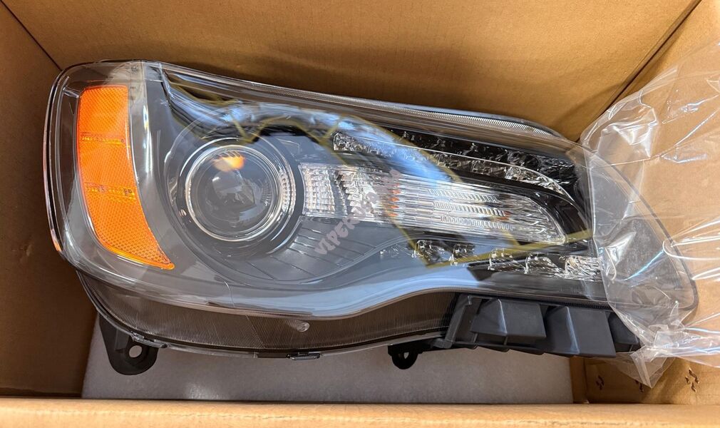 Lampa przednia lewa Xenon 68085419AG
