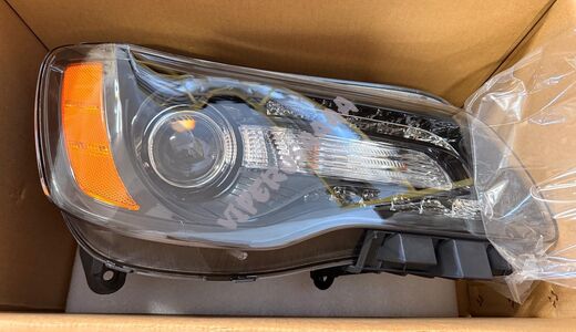 Lampa przednia lewa Xenon 68085419AG