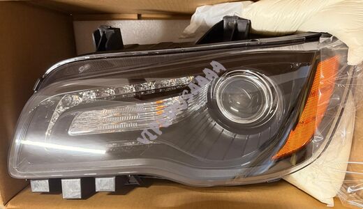 Lampa przednia lewa halogenowa Ciemna 68085417AF